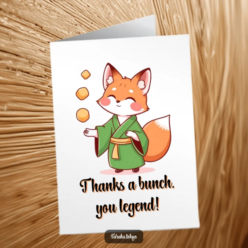 Funny Free Printable Thank You Card: Playful fox in green kimono juggles colorful mochi, offering thanks with a funny, whimsical twist.