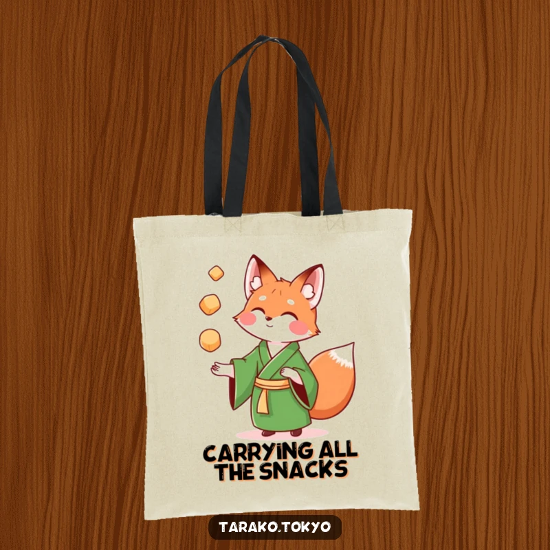 Funny Tote Bag with a playful fox in a green kimono juggling colorful mochi, great for carrying essentials.